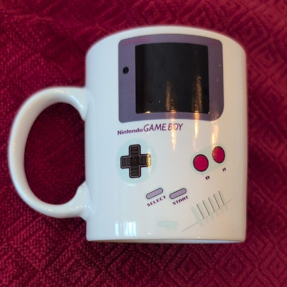 Paladone Game Boy Heat Change Mug With Super Mario Scenes.